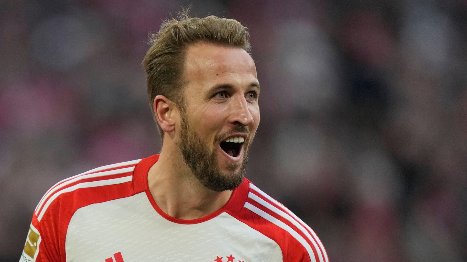 Bayern's Harry Kane celebrates after scoring his side's second goal during the German Bundesliga soccer match between Bayern Munich and Heidenheim at the Allianz Arena stadium in Munich, Germany, Saturday, Nov. 11, 2023