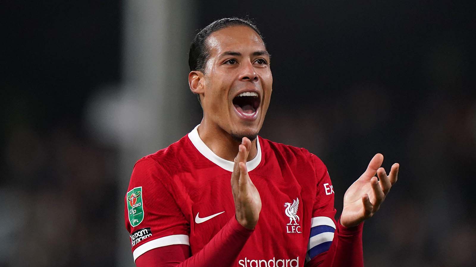 Liverpool's Virgil van Dijk applauds the fans