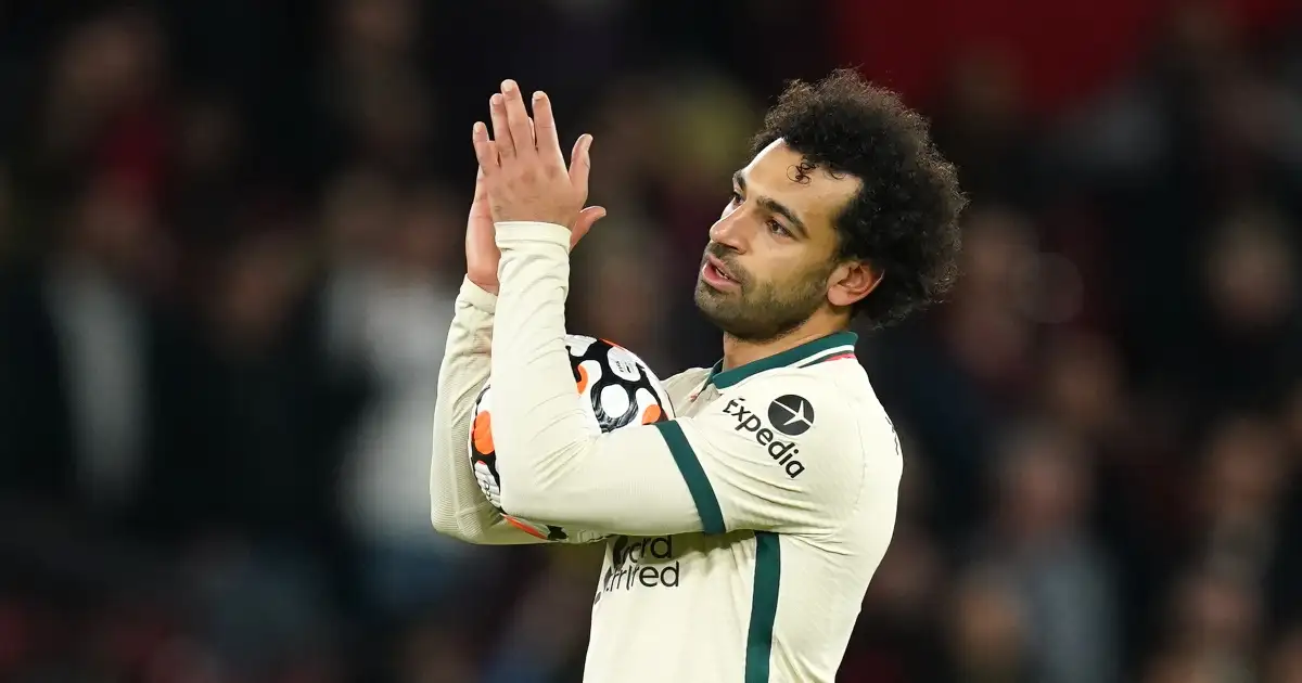 Mohamed Salah with the match ball after becoming the first Premier League player to score a hat-trick at Old Trafford