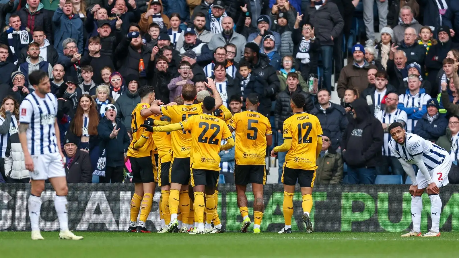 Wolves celebrate in front of West Brom fans