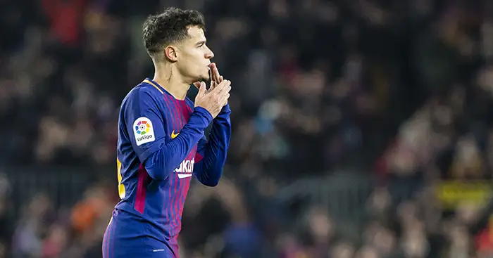 Philippe Coutinho (14) celebrates scoring for Barcelona