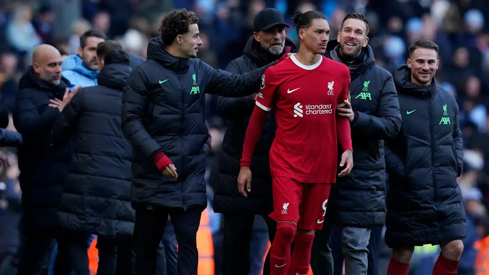 MANCHESTER, UK. 25th Nov, 2023. Darwin Nunez of Liverpool is led away by team mates after exchanging words with Josep Guardiola coach of Manchester City (L) at the final whistle during the Premier League match at the Etihad Stadium, MANCHESTER.