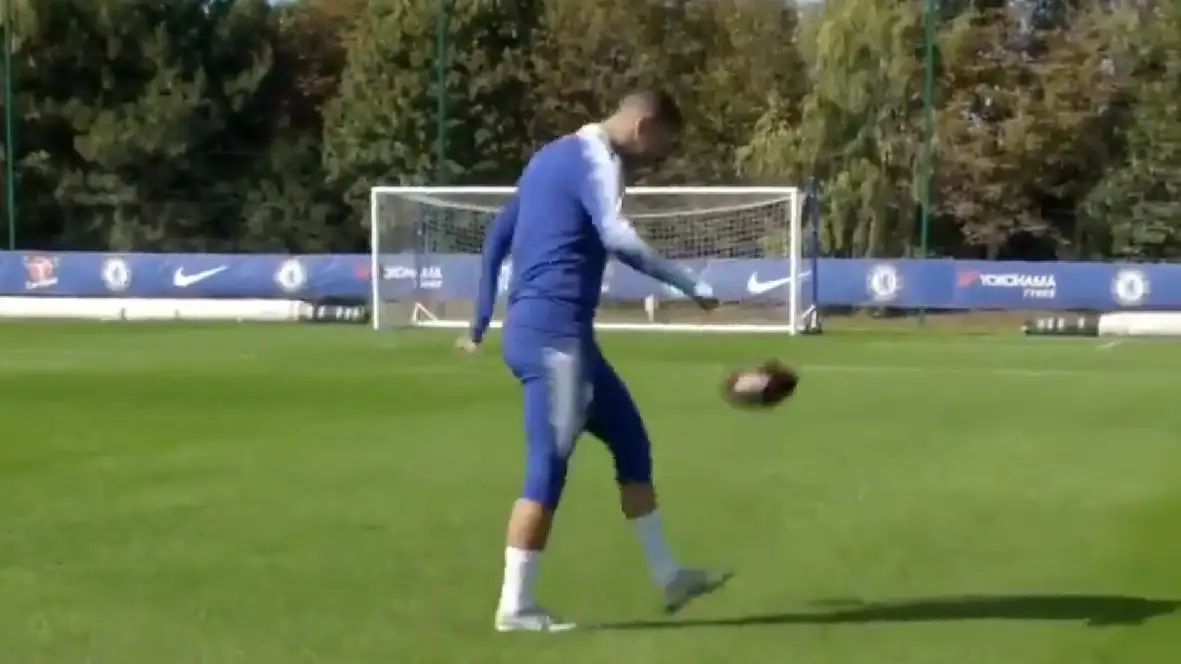 Eden Hazard juggles an American football (Credit: @ChelseaFC Twitter)