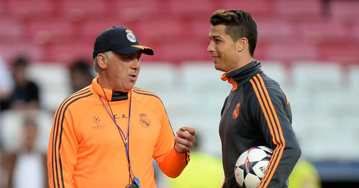 Real Madrid manager Carlo Ancelotti (left) chats with Cristiano Ronaldo during training, Estadio da Luiz, Lisbon, 23 May 2014