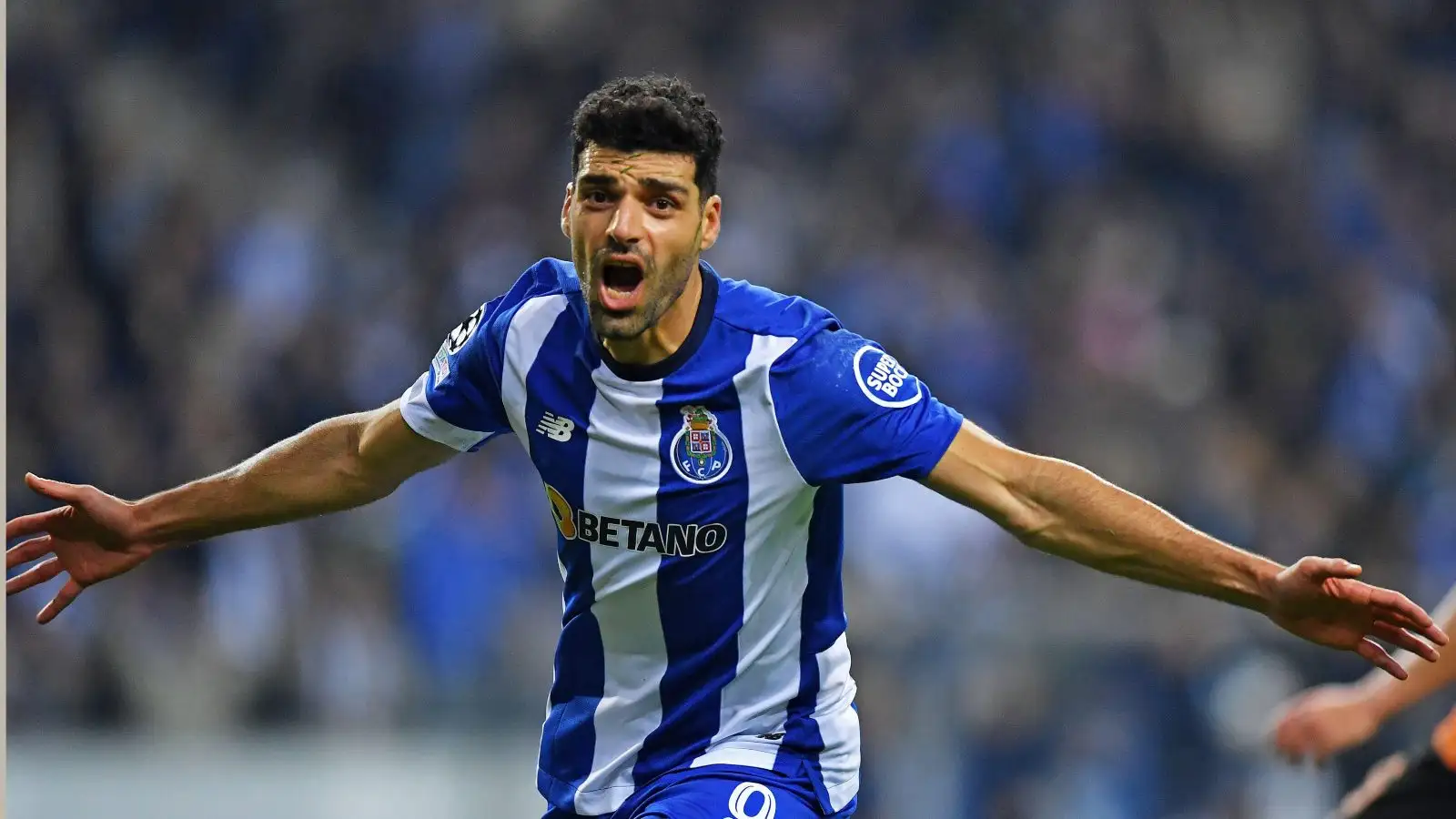 Mehdi Taremi celebrates for Porto.