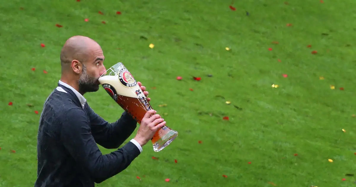 Pep Guawinning the Bundesliga with rdiola celebrates Bayern Munich by drinking a beer, Allianz Arena in Munich, Germany, 14 May 2016.