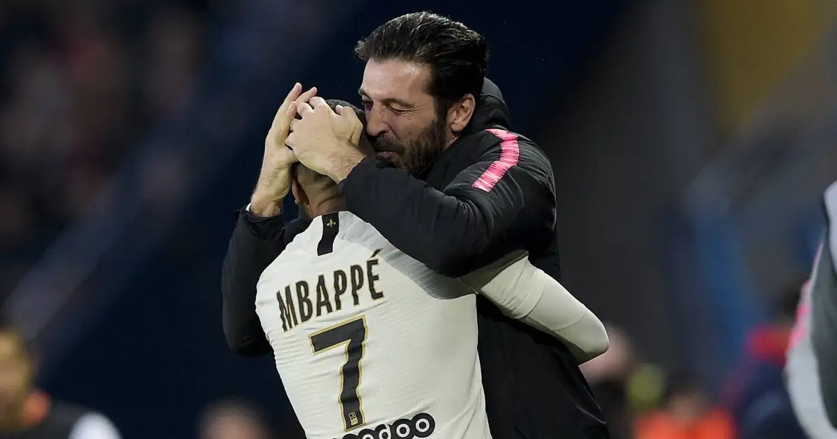 Italian goalkeeper Gianluigi Buffon celebrates with Kylian Mbappe, Caen v PSG, 02 March 2019