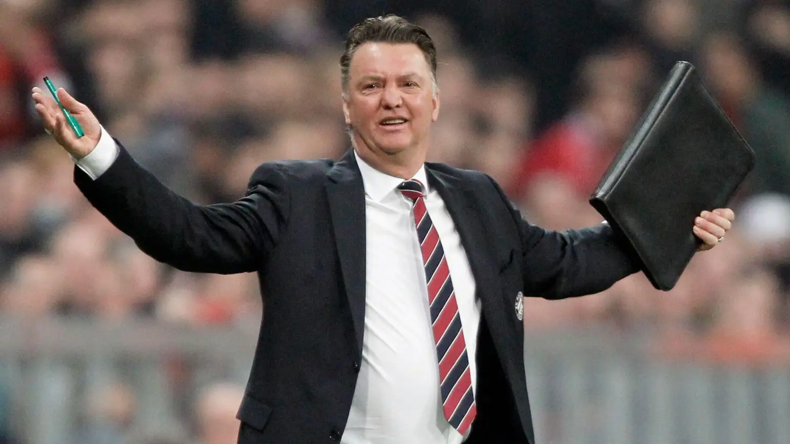 Munich's head coach Louis van Gaal reacts during the Champions League match, round of 16 second leg, between FC Bayern Munich and Inter Milan in Munich, southern Germany, on Tuesday, March 15, 2011.