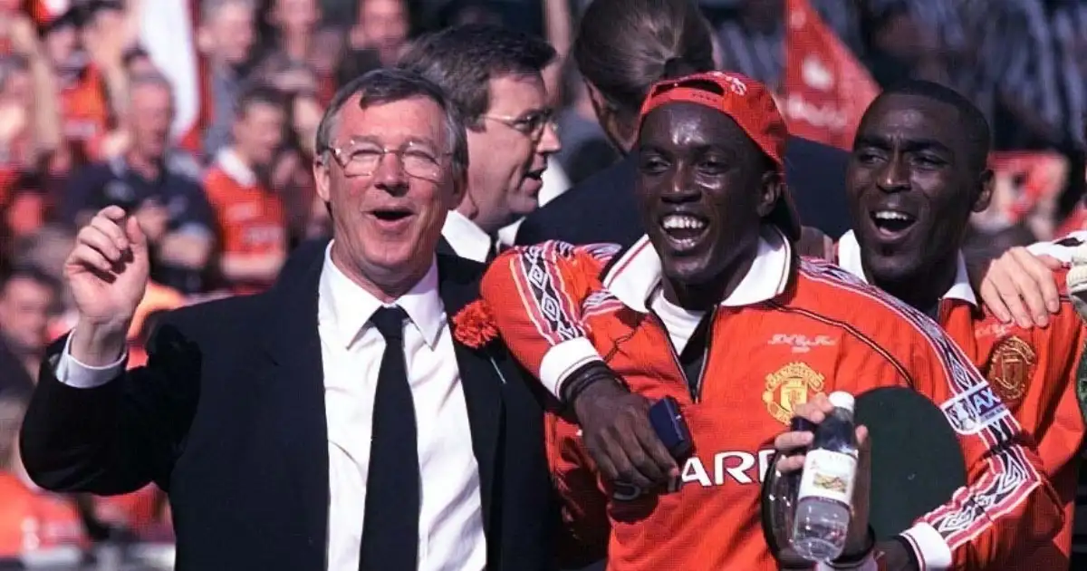 Manchester United's Dwight Yorke with manager Alex Ferguson after the Premier League game against Tottenham Hotspur. Old Trafford, Manchester, 16 May 1999.