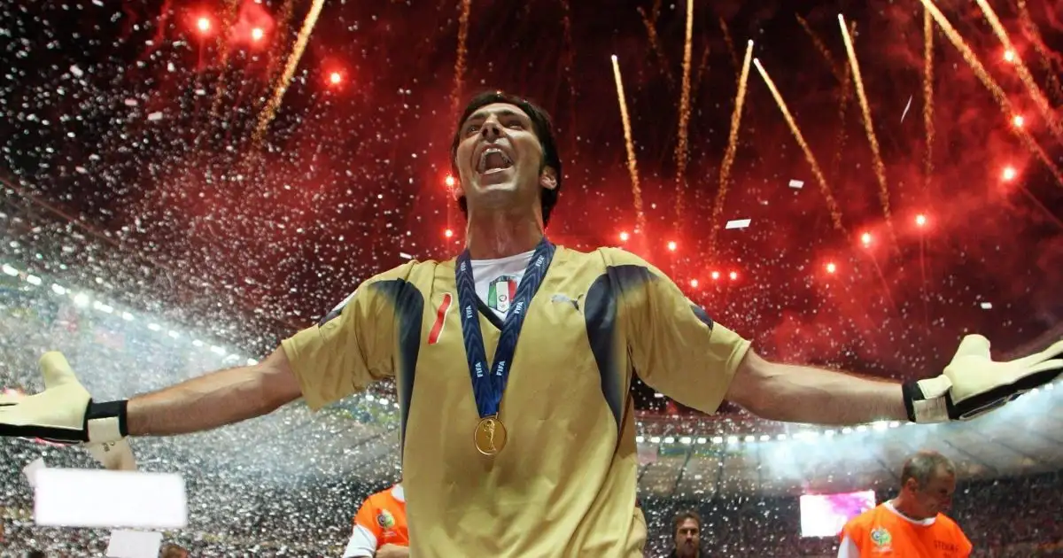 Gianluigi Buffon celebrates with his arms open and fireworks above his head after Italy had won the 2006 World Cup final against France in Berlin, July 2006.