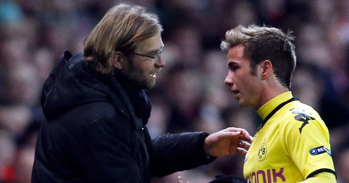 Borussia Dortmund's Mario Gotze (R) shakes hands with team manager Jurgen Klopp as he is substituted during their Group F Champions League soccer match against Arsenal at the Emirates stadium in London November 23, 2011.