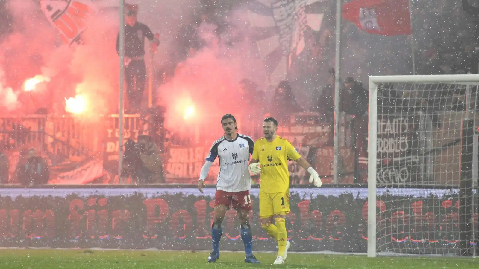 Hamburg's Daniel Heuer Fernandes is consoled after scoring an own goal in the derby.